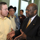 Herman Cain greets Iowa voters. (Steve Pope/Getty Images)